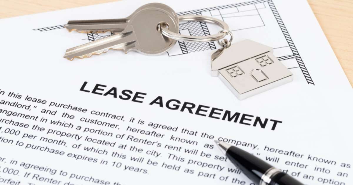 A lease agreement with a pen and keys