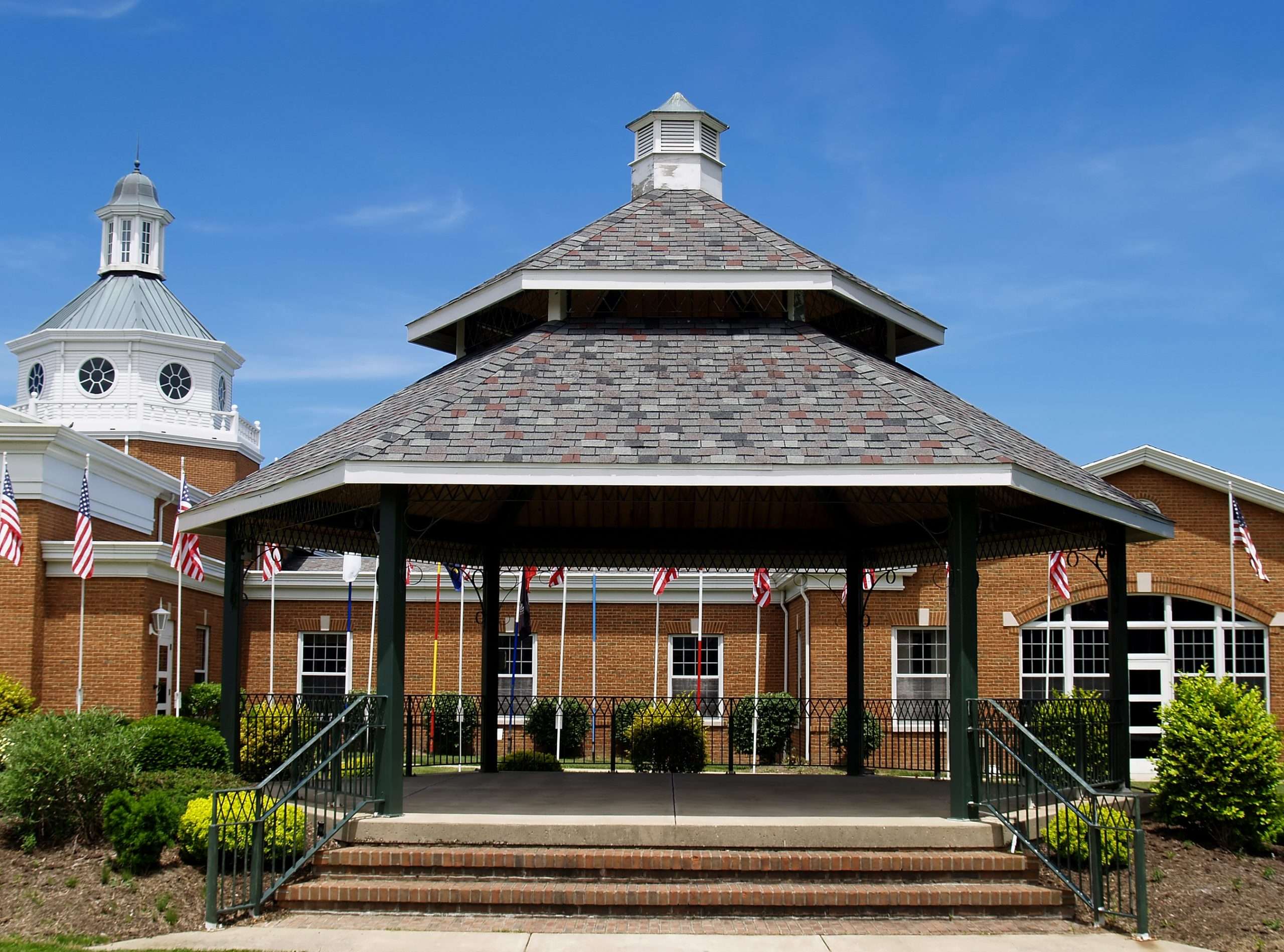 A public gazebo with American Flags in a park in Eastlake Ohio
