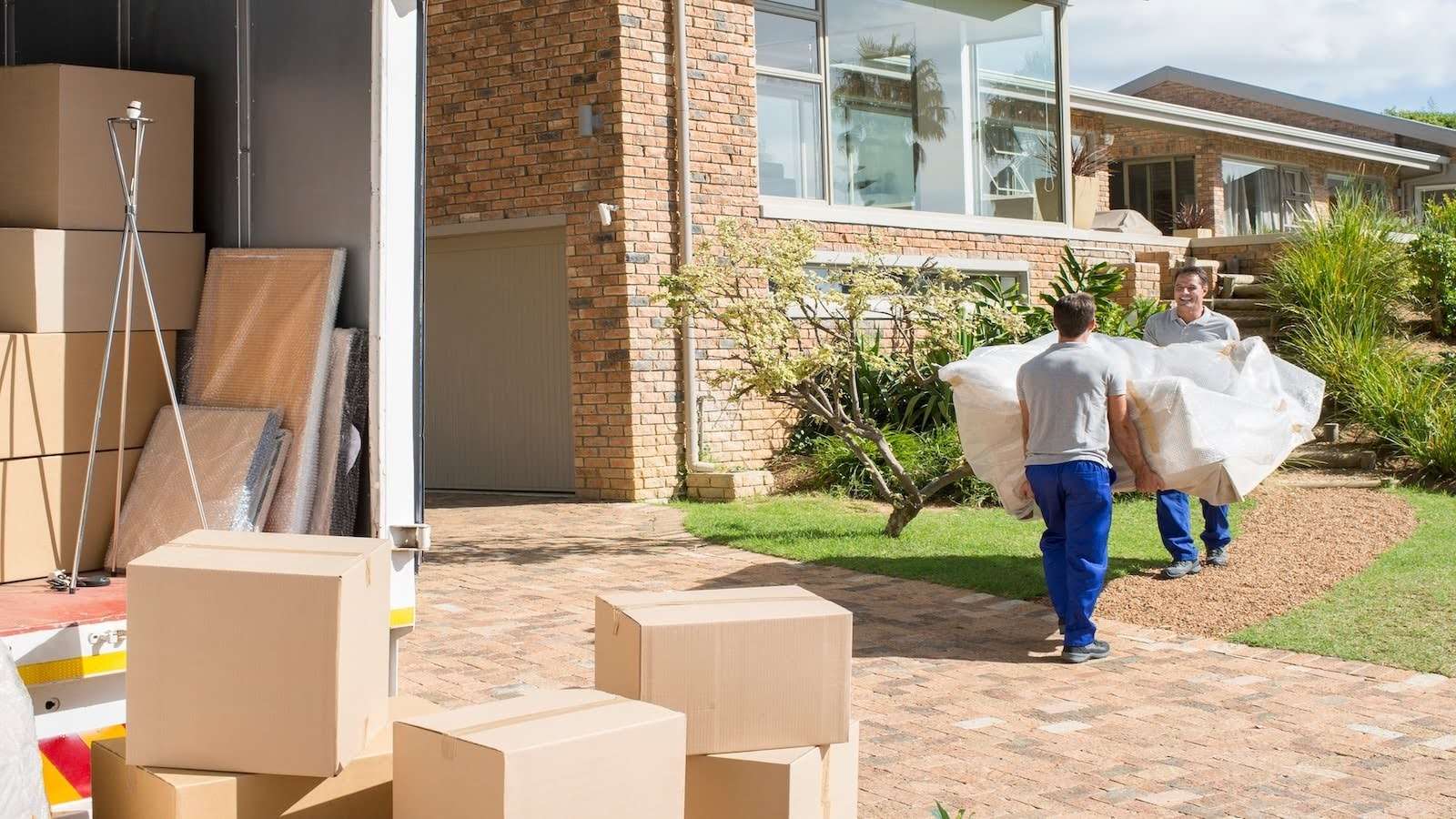 Movers carrying sofa
