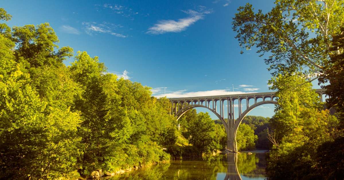 rch bridge spanning a river in Cuyahoga Valley National Park